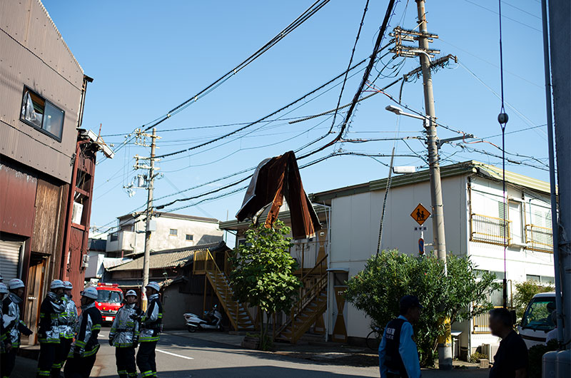 An iron object hanging on a power cable