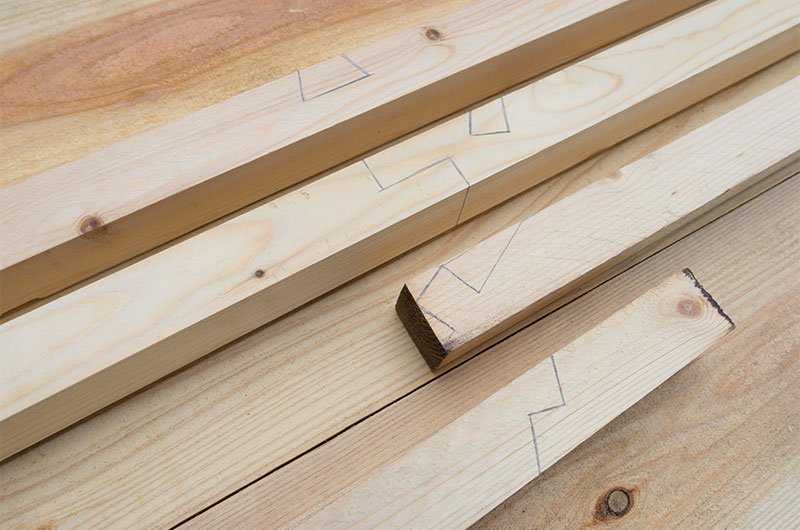 Marking with pencil on parts for wooden slope