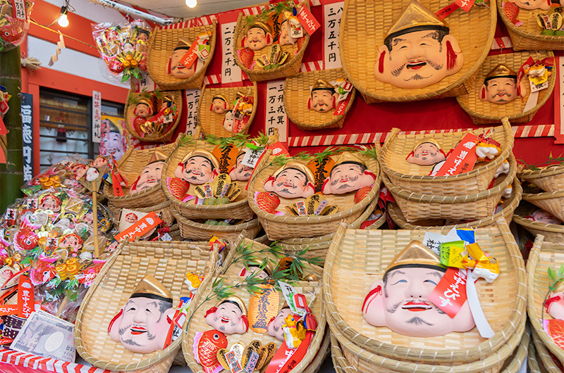 Lots of lucky charms in festival of God Ebisu at Hattori Shrine