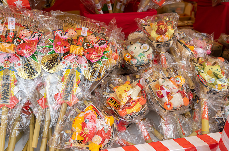 Lots of lucky charms in festival of God Ebisu at Hattori Shrine