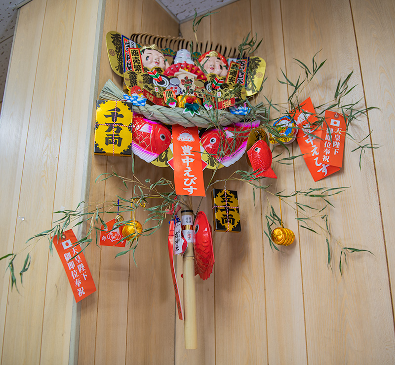 Lucky charm, rake, in festival of God Ebisu Toyonaka at Hattori Shrine