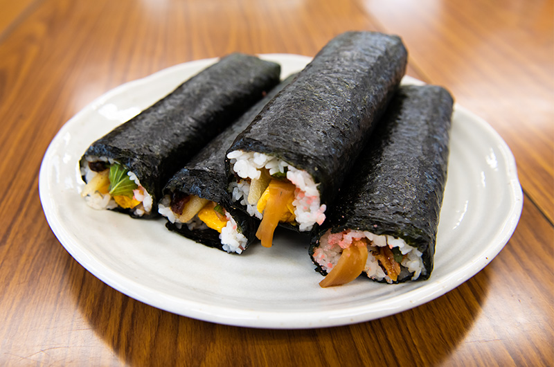 Lucky sushi rolls at Setsubun festival of Hattori Shrine in second year of Reiwa